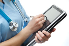 Doctor Holding Medical Tablet